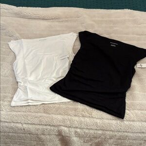 White and Black Sleeveless Tops